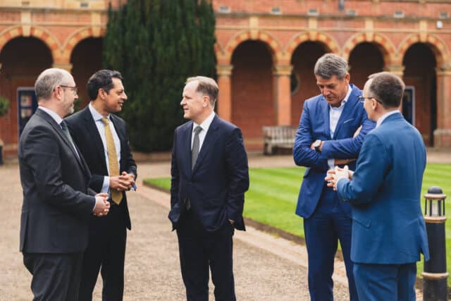 Guests in conversation outdoors